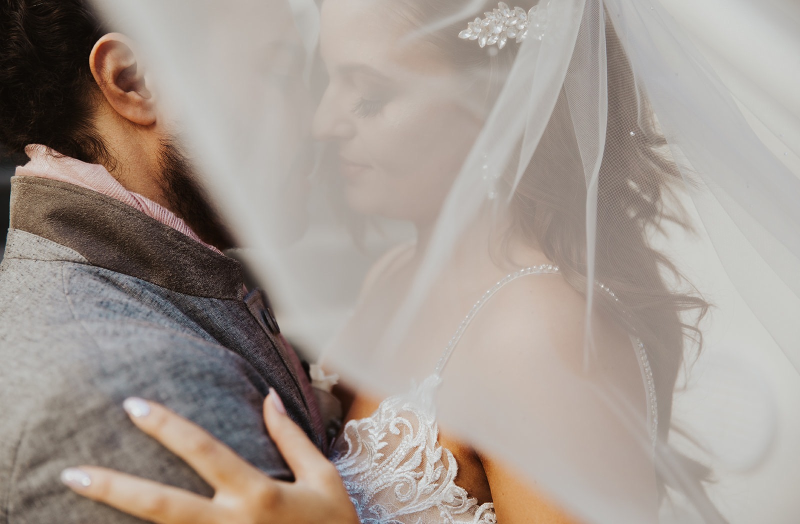 Erica and Patrick beneath her veil, close portrait at Park Hyatt Aviara in Carlsbad